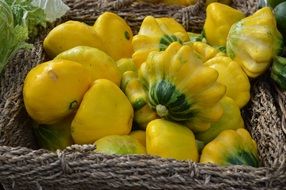 yellow pumpkin and pepper in the basket