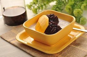 mango and black rice in sauce