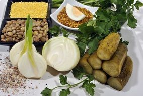 egg onion cucumbers herbs on plate