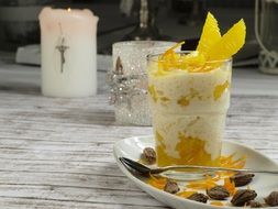 Beautiful decorated Dessert with oranges in the glass