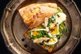 sandwich with boiled egg and herbs