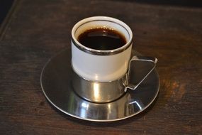porcelain Cup of Coffee on table