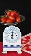 tomatoes on the kitchen scales