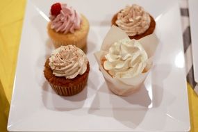 decorated cupcakes on the plate