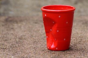 red ceramic mug