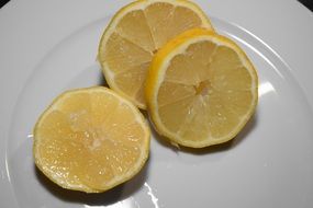 sliced lemon on a white plate