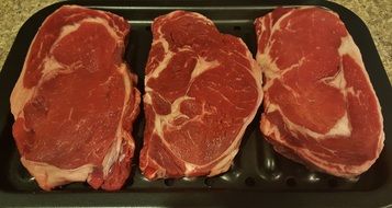 Raw Meat, beef Steaks on pan