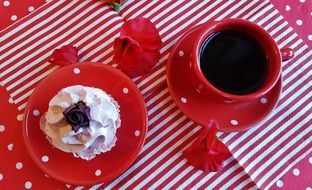 coffee in a red Cup and cake