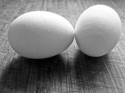 two white eggs on the table