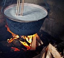 Boiler above fire, traditional cheese production