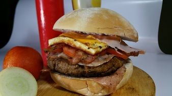 fried meat and bacon burger
