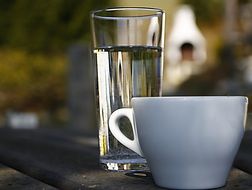 Cup and glass of water