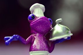 figure of a bright purple cook frog