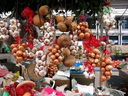 colorful onions garlic and vegetables in the Lisbon market