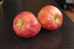 pink apples on the table