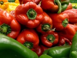 red green yellow paprikas market