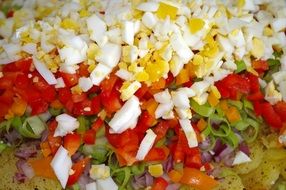 salad with vegetables and eggs close-up