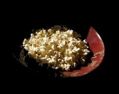 popcorn is in the plate