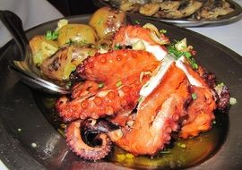 seafood with potatoes as a main course