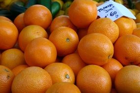 beautiful delicious Oranges Fruits on the market close-up