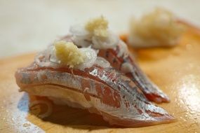 Sushi with red fish in the restaurant