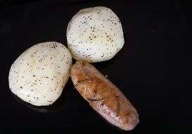 isolated grilled sausage with potato