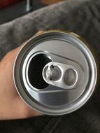 beer can in man's hand