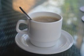 hot morning coffee in a white cup