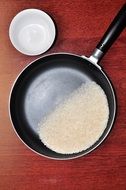 white rice in frying pan