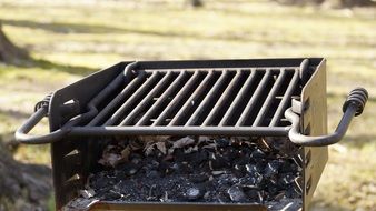 Barbecue Grill above coal outdoor