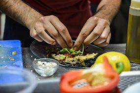 chef serving a dish in restaurant