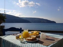 breakfast with orange juice on the table