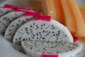 cut dragon fruit on a plate