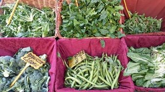 green salads and beans in the market