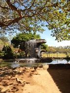 fountain on pond among trees, Brazil