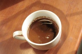 black coffee in a white cup
