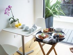 Breakfast on a tables in room