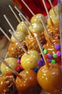 sweet Candied Apple caramel Dessert on stick