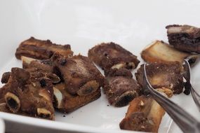 fried pork ribs on a plate