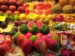 colorful fruits on a market counter