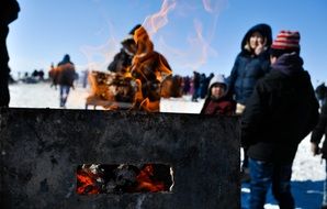 People are making shashlyk on the fire, mongolia