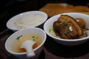 Braised pork on rice in the plates