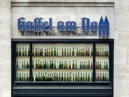 glass bottles on a beer shop window