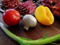 Colorful raw vegetables and mear for grilling