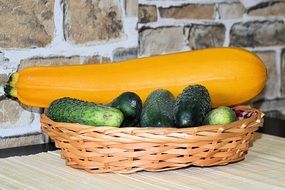 yellow Zucchini and Cucumbers in basket