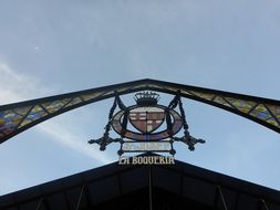 signboard at the gate of the market in barcelona