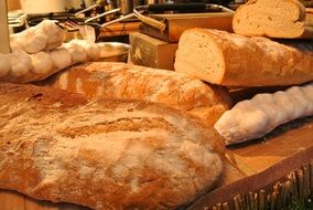 Bread and garlic on wooden table