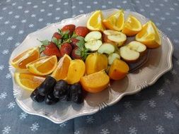 chopped fresh fruit on a tray