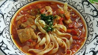 Lagman with noodles in a plate