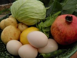 fresh chicken eggs and vegetables